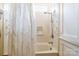 This cozy bathroom features a shower and bathtub combo perfect for relaxation and functionality at 15 Kings Mountain St, York, SC 29745