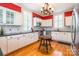 Bright kitchen with white cabinets, black countertops, and modern stainless steel appliances at 15 Kings Mountain St, York, SC 29745