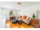 Cozy living room featuring wood floors, stylish seating, and abundant natural light at 15 Kings Mountain St, York, SC 29745