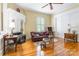 Comfortable living room features hardwood floors, fireplace, and plenty of natural light at 15 Kings Mountain St, York, SC 29745