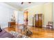 Spacious living room with hardwood floors, plenty of seating, and natural light at 15 Kings Mountain St, York, SC 29745