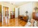 Office space boasting hardwood floors, natural light, large closet and view into the entry way at 15 Kings Mountain St, York, SC 29745