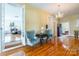 Sitting area with hardwood floors, chandelier, and doorway views into other rooms at 15 Kings Mountain St, York, SC 29745