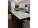 Modern kitchen with a large island, new appliances, and white cabinets at 1909 Normandy Rd, Kannapolis, NC 28081