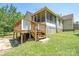 Low wooden back deck with screened porch and steps leading to yard, excellent for entertaining at 1920 E Nc Hwy 24/27 None, Biscoe, NC 27209