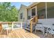 Back deck with steps leading to yard, offers opportunity for outdoor dining and relaxation at 1920 E Nc Hwy 24/27 None, Biscoe, NC 27209