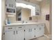 Bright bathroom with an extended vanity, plentiful storage, and a large mirror at 1920 E Nc Hwy 24/27 None, Biscoe, NC 27209