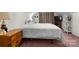 Comfortable bedroom with neutral tones, offering a relaxing retreat with natural light and ample space at 1920 E Nc Hwy 24/27 None, Biscoe, NC 27209