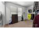 Functional laundry room with natural light, shelving, and storage at 1920 E Nc Hwy 24/27 None, Biscoe, NC 27209