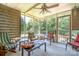 Relaxing screened porch with comfortable seating, ideal for enjoying outdoor living and serene views at 1920 E Nc Hwy 24/27 None, Biscoe, NC 27209