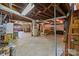 Unfinished basement with concrete floor and exposed ductwork at 207 W 21St St, Kannapolis, NC 28081