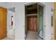 View of a wood-lined closet with clothing rods at 207 W 21St St, Kannapolis, NC 28081