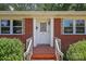 Inviting front porch with patterned tile and decorative brick accents at 207 W 21St St, Kannapolis, NC 28081