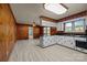 Spacious kitchen featuring white cabinets, black countertops, and updated flooring for a clean, modern look at 207 W 21St St, Kannapolis, NC 28081