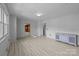 Open-concept living room with laminate floors and natural light at 207 W 21St St, Kannapolis, NC 28081