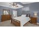 Tranquil bedroom with natural light and wooden furniture at 2156 Wedgewood Dr, Matthews, NC 28104