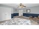 Spacious bedroom with light carpet, two-toned walls, offering ample closet space and a view of the neighborhood at 2156 Wedgewood Dr, Matthews, NC 28104