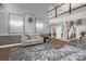 Comfortable living room with paneled walls, eye-catching decor, and staircase at 2156 Wedgewood Dr, Matthews, NC 28104