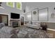 Inviting living area with fireplace, large windows, and elegant decor at 2156 Wedgewood Dr, Matthews, NC 28104