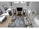 Aerial view of living room with a fire place, hardwood floors, with furniture and decorations throughout the home at 2156 Wedgewood Dr, Matthews, NC 28104
