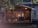 Enclosed screened porch with ample seating and dining space, perfect for outdoor relaxation and entertainment at 2156 Wedgewood Dr, Matthews, NC 28104