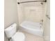 Clean and renovated bathroom featuring subway tile, tub and toilet at 2222 Camp Greene St, Charlotte, NC 28208