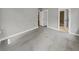 Open bedroom with hardwood floors and white trim at 2222 Camp Greene St, Charlotte, NC 28208