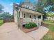 Charming two-story home with a covered front porch and stone accents at 2222 Camp Greene St, Charlotte, NC 28208