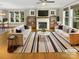 Bright living room with fireplace, neutral tones, and stylish furnishings at 2222 Camp Greene St, Charlotte, NC 28208