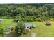 Aerial view of home with large backyard and surrounding trees at 223 Green Meadows Dr, Kings Mountain, NC 28086