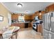 Cozy kitchen featuring modern appliances, ample cabinetry, and an adjacent dining area at 223 Green Meadows Dr, Kings Mountain, NC 28086