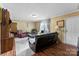 Comfortable living room with a plush rug, hardwood floors, and bright natural light at 223 Green Meadows Dr, Kings Mountain, NC 28086