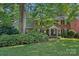 Traditional brick home with a covered front porch and manicured landscaping at 2358 Sparrow Dr, Rock Hill, SC 29732