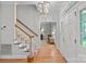 Welcoming foyer with hardwood floors, staircase, and arched entryway at 2358 Sparrow Dr, Rock Hill, SC 29732