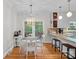 Well-designed kitchen with granite countertops, a breakfast bar, and access to an outdoor space at 2358 Sparrow Dr, Rock Hill, SC 29732