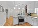 Well-lit kitchen featuring stainless steel appliances, granite countertops, and a center island at 2358 Sparrow Dr, Rock Hill, SC 29732