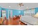 Spacious bedroom with hardwood floors, natural light, stylish furnishings, and comfortable seating at 2358 Sparrow Dr, Rock Hill, SC 29732