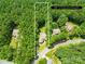 Aerial view of the property showing its placement on a wooded 0.77-acre lot at 2455 Talbot Ct, Sherrills Ford, NC 28673