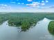 Aerial view of the lake and surrounding landscape, showcasing the area's natural beauty at 2455 Talbot Ct, Sherrills Ford, NC 28673