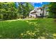 Lush backyard featuring a large grassy area perfect for outdoor activities and entertaining at 2455 Talbot Ct, Sherrills Ford, NC 28673