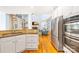 Modern kitchen featuring stainless steel appliances and seamlessly connecting to a spacious and inviting living area at 2455 Talbot Ct, Sherrills Ford, NC 28673
