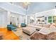 Open concept living space with soaring ceilings and seamless flow to the kitchen, perfect for entertaining at 2455 Talbot Ct, Sherrills Ford, NC 28673