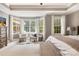 Bright main bedroom featuring plush carpet, large windows and seating area at 2455 Talbot Ct, Sherrills Ford, NC 28673