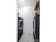 Functional laundry room features new washer and dryer units, ideal for convenient chores at 2510 Cranbrook Ln, Charlotte, NC 28207