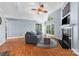 Bright living room boasts vaulted ceilings, a fireplace, and large windows offering ample natural light at 2510 Cranbrook Ln, Charlotte, NC 28207