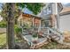 Inviting back deck with ample seating and covered outdoor living space, perfect for relaxing or entertaining at 2936 Saintfield Pl, Charlotte, NC 28270