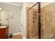Walk-in shower with updated fixtures highlights the primary bathroom at 3015 Rochester Ct, Monroe, NC 28110