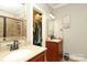 Double sink vanity and updated fixtures highlight the primary bathroom at 3015 Rochester Ct, Monroe, NC 28110