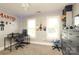 Neutrally decorated bedroom with two windows for natural light at 3015 Rochester Ct, Monroe, NC 28110