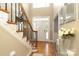 Bright and airy foyer with hardwood floors and staircase at 3015 Rochester Ct, Monroe, NC 28110